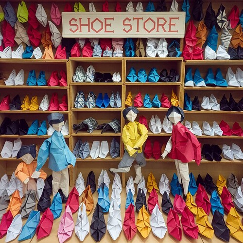 a-photo-of-a-shoe-store-made-entirely-of-origami-t-Y94kf-OSRbGbt1x11XgNnw-CdWmI4K6RNS1L0_hkuG57w