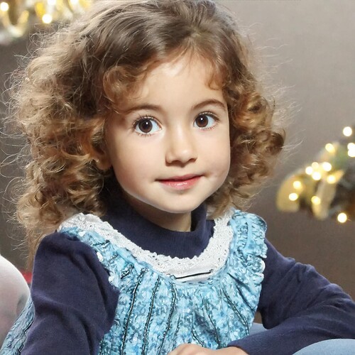 Firefly an Israeli child with curly, light brown hair and bright brown eyes--no filter airbrushing -